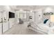 Spacious main bedroom with pillars, large bed, sitting area and fireplace at 3215 Oxleas Ct, Cumming, GA 30041
