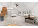 Bright bonus room featuring built-in shelving, a playhouse, and comfortable sitting area at 3215 Oxleas Ct, Cumming, GA 30041