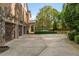 A driveway leads to a spacious three-car garage and offers ample parking at 3215 Oxleas Ct, Cumming, GA 30041