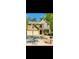 Charming two-story home with a manicured lawn, a two car garage, and beautiful architectural details at 365 Friars Head Dr, Suwanee, GA 30024