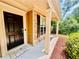 Charming front entrance featuring a black door, stone accents, and a welcoming porch at 365 Friars Head Dr, Suwanee, GA 30024