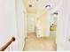 Upstairs hallway with doors to bedrooms, neutral carpeting, and access to rooms at 365 Friars Head Dr, Suwanee, GA 30024