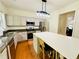 Bright kitchen featuring stainless steel appliances and a large island with seating at 365 Friars Head Dr, Suwanee, GA 30024