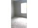 Bright bedroom with natural light ready for carpet install at 3536 Dogwood Pass, Stonecrest, GA 30038