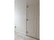 New double closet doors featuring prepped trim, ready for painting at 3536 Dogwood Pass, Stonecrest, GA 30038