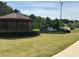 A gazebo sits on a grassy lawn, offering a spot for relaxation in the community at 3536 Dogwood Pass, Stonecrest, GA 30038