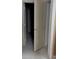 A bright hallway featuring a crisp, white door that partially reveals an adjacent room, ready for personalization at 3536 Dogwood Pass, Stonecrest, GA 30038