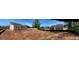 Home's rear elevation features several windows for natural light and a door for easy backyard access at 3536 Dogwood Pass, Stonecrest, GA 30038