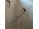 Detail of tiled shower with modern fixtures and niche at 3536 Dogwood Pass, Stonecrest, GA 30038