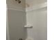 Full bathroom with a shower featuring a shower head and a small shelf at 3536 Dogwood Pass, Stonecrest, GA 30038