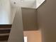 Staircase with railing, leading upstairs at 3536 Dogwood Pass, Stonecrest, GA 30038