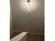 Cozy stairwell with classic light fixture at 3536 Dogwood Pass, Stonecrest, GA 30038