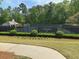 Two outdoor tennis courts surrounded by lush trees are available for residents to enjoy tennis in a beautiful setting at 3536 Dogwood Pass, Stonecrest, GA 30038