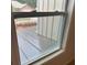 The home's window view includes a wood porch, adding a distinctive design feature at 3536 Dogwood Pass, Stonecrest, GA 30038