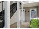 Townhome entrance with multiple doors and a staircase leading to the upper floors at 111 Fair Haven Se Way, Smyrna, GA 30080