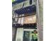 Exterior view of a damaged balcony with a sliding glass door at 1316 Camelot Dr, College Park, GA 30349