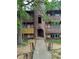 Unique apartment building featuring a turret and multiple balconies, creating an inviting and distinctive living space at 1316 Camelot Dr, College Park, GA 30349