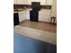 Kitchen featuring white cabinets and modern black appliances at 1316 Camelot Dr, College Park, GA 30349