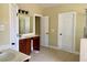 Bathroom with double sink vanity and tile flooring at 220 Fannin Ln, Mcdonough, GA 30252