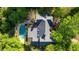 A private backyard features a lovely in-ground pool and lush landscaping at 4820 Coppedge Trl, Peachtree Corners, GA 30096