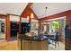 Kitchen with island, black appliances, a breakfast nook and access to the outdoors at 4820 Coppedge Trl, Peachtree Corners, GA 30096