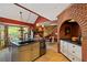 Bright kitchen with stainless steel appliances, granite counters, island and breakfast area at 4820 Coppedge Trl, Peachtree Corners, GA 30096