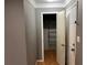 Bedroom closet with organized shelving at 5147 Roswell Rd # 9, Atlanta, GA 30342