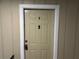 Condo unit door with security features and clear numbering for easy identification at 5147 Roswell Rd # 9, Atlanta, GA 30342