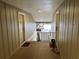 Well-lit hallway showing entrance to unit #10 at 5147 Roswell Rd # 9, Atlanta, GA 30342
