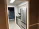 Modern kitchen features stainless steel appliances and gray cabinets at 5147 Roswell Rd # 9, Atlanta, GA 30342