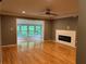 Spacious living room featuring a modern fireplace, hardwood floors, and natural light at 5147 Roswell Rd # 9, Atlanta, GA 30342