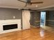 Living room with modern fireplace and white barn door at 5147 Roswell Rd # 9, Atlanta, GA 30342