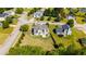 Aerial view of a house with a large backyard and a neighborhood setting at 6955 Pompas Ct, Douglasville, GA 30135