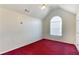 Bedroom with a vaulted ceiling featuring an arched window at 6955 Pompas Ct, Douglasville, GA 30135
