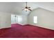 Spacious bedroom with vaulted ceiling, ceiling fan and large windows at 6955 Pompas Ct, Douglasville, GA 30135