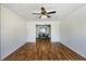 Open dining room with hardwood floors and a view into the next room at 6955 Pompas Ct, Douglasville, GA 30135