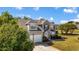Charming two-story home with a well-manicured lawn and attached garage at 6955 Pompas Ct, Douglasville, GA 30135