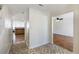 Foyer with decorative tile leading to the living room and kitchen at 6955 Pompas Ct, Douglasville, GA 30135