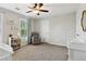 Charming Bedroom featuring a crib, chair and soft pastel accents at 85 Lawson St, Buford, GA 30518