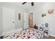 bedroom featuring a bed with playful themed bedding and bright decorations at 85 Lawson St, Buford, GA 30518