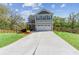 Charming two-story home featuring a front porch, two car garage and a fenced in yard at 85 Lawson St, Buford, GA 30518