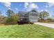 Charming two-story home featuring a front porch, two car garage and a beautifully landscaped front yard at 85 Lawson St, Buford, GA 30518