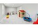 Bright and spacious play area featuring neutral walls and flooring, perfect for  at 85 Lawson St, Buford, GA 30518