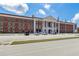 Exterior shot of Buford High School in Buford, GA featuring a parking lot and traditional architecture at 85 Lawson St, Buford, GA 30518