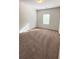 Bedroom with carpeted floors and a bright window at 2102 Talmai Dr, Snellville, GA 30078