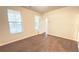 Bright bedroom with plush carpet, large windows, and neutral paint at 2102 Talmai Dr, Snellville, GA 30078