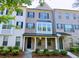 Charming brick townhouse with a covered entrance and well-maintained landscaping at 2102 Talmai Dr, Snellville, GA 30078