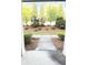 Scenic view of front yard landscaping as seen from covered front porch at 2102 Talmai Dr, Snellville, GA 30078