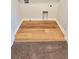 Dedicated laundry area with wooden vinyl floor at 2102 Talmai Dr, Snellville, GA 30078