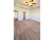 Large main bedroom featuring ceiling fan, lots of natural light and attached closet/bath at 2102 Talmai Dr, Snellville, GA 30078